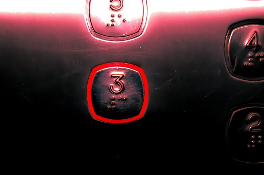 Illuminated elevator control buttons
